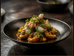 Assiette gastronomique sur fond noir